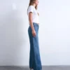 Tsember-jeans met lage taille en wijde pijpen
