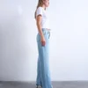 Tsember-jeans met lage taille en wijde pijpen